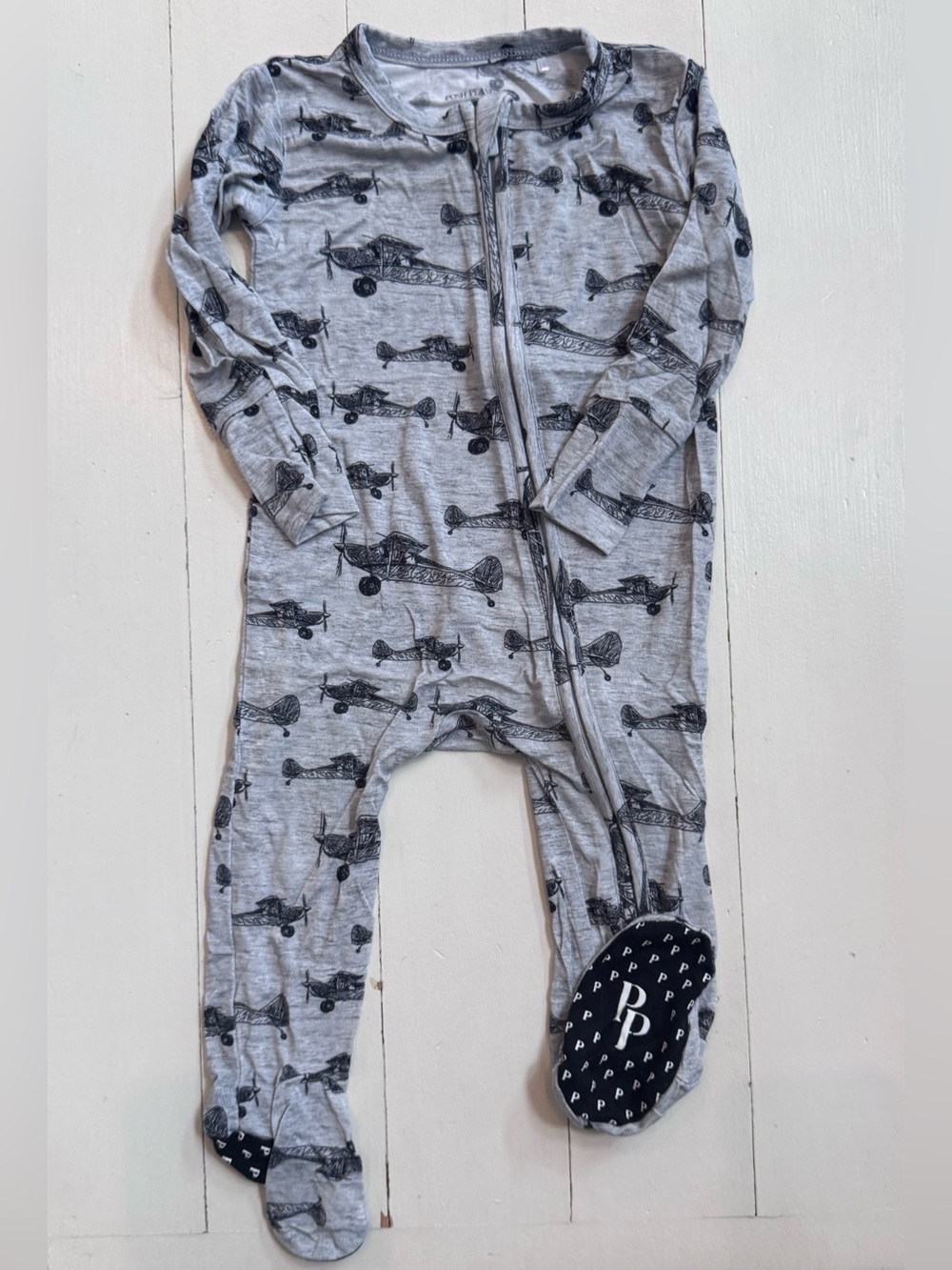 Posh Peanut Grey Airplane Print Footed One-Piece “Logan”